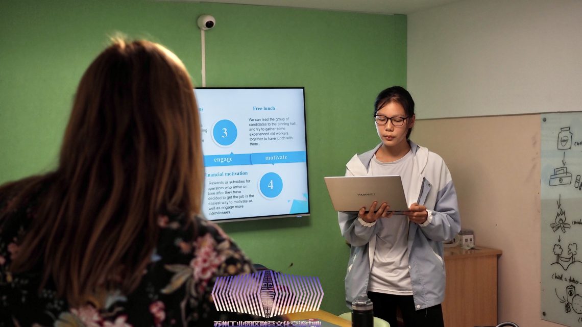Flora, student, presenting real case solution
