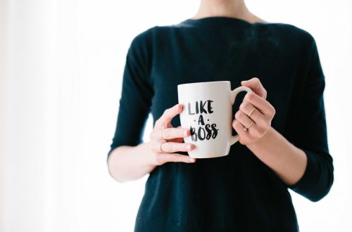 Lady holding a mug saying "like a boss"